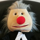 Foto einer Stoffpuppe in Pastoren-Kleidung
